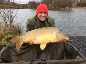 Mirror carp caught at L'angottiere carp fishery offering exclusive carp fishing in france