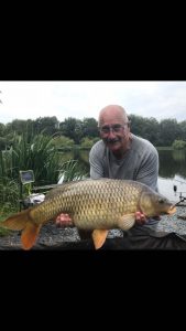 carp capture at l'angottiere carp fishery offering exclusive carp fishing in france