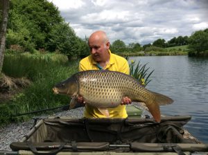 Carp capture at L'Angottiere Carp Fishery offering exclusive carp fishing in France. If you are looking for a carp lake or fishing holiday in France please check out www.carpfishingnormandy.com