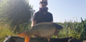 carp capture at L'Angottiere carp fishery offering exclusive carp fishing in france